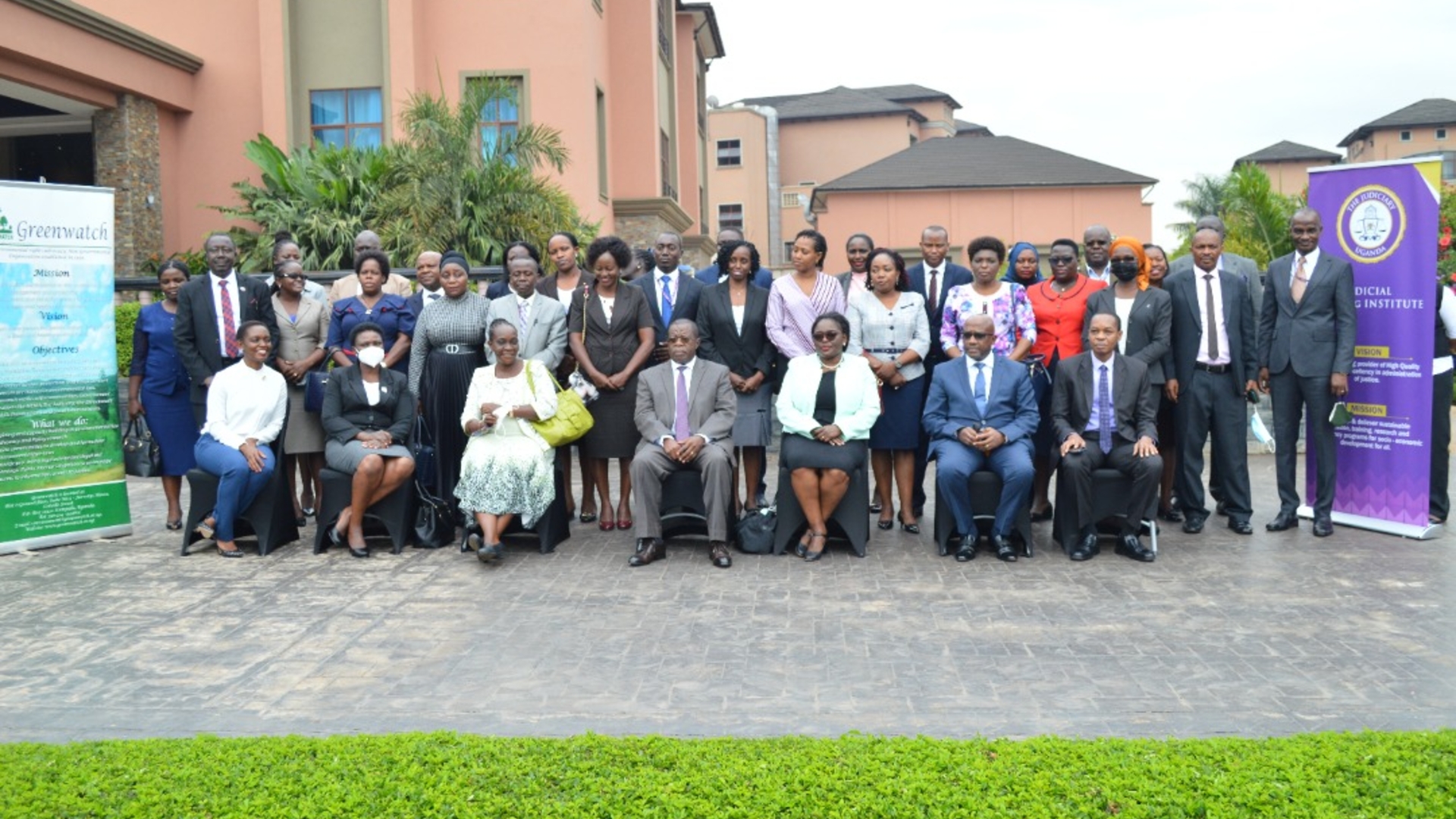 A group photo of Judicial Officers and the Director Greenwatch at Mestil hotel and residences, Kampala